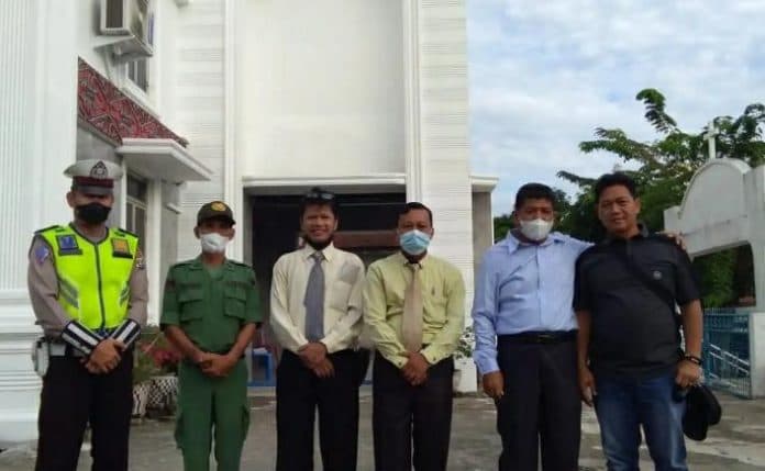 peringatan_kenaikan_isa_al_masih_polisi_kawal_jemaat_di_hkbp_padang_hilir_tebing_tinggi