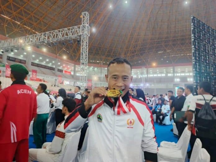 pertahankan_gelar_atlet_wushu_yusuf_widiyanto_persembahkan_emas_untuk_anak_tercinta