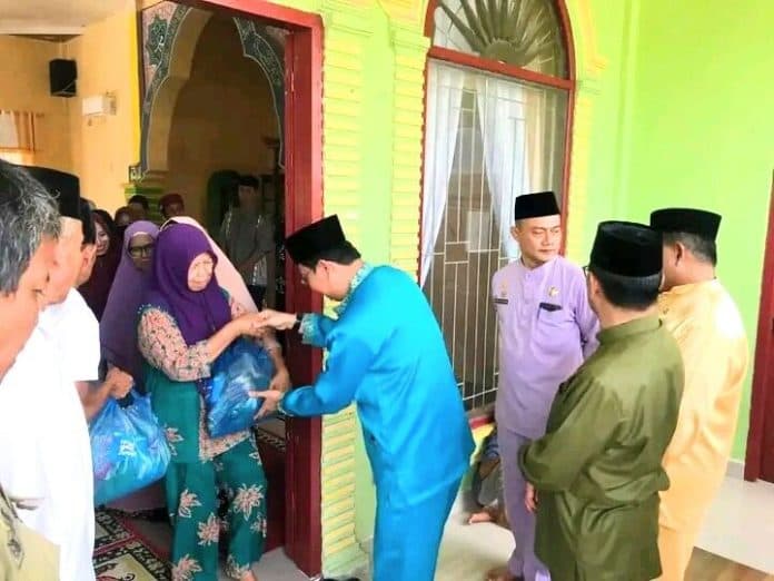 pj_bupati_batu_bara_ajak_warga_sukseskan_pemilu_dengan_hadir_ke_tps