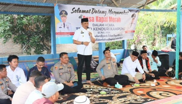 pj_bupati_batu_bara_apresiasi_tradisi_kenduri_kampung_di_desa_kapal_merah