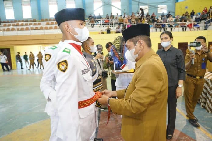 pj_wali_kota_tebing_tinggi_kukuhkan_paskibraka_di_gor_asber_nasution