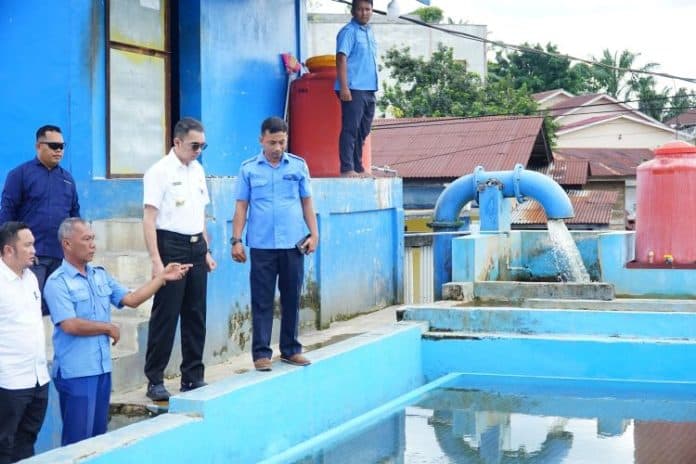 pjs_bupati_labuhanbatu_pastikan_kualitas_pelayanan_pudam_tirta_bina