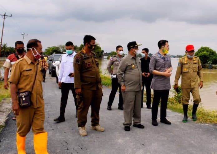 pjs_bupati_sergai_tinjau_lokasi_banjir_di_kecamatan_sei_bamban