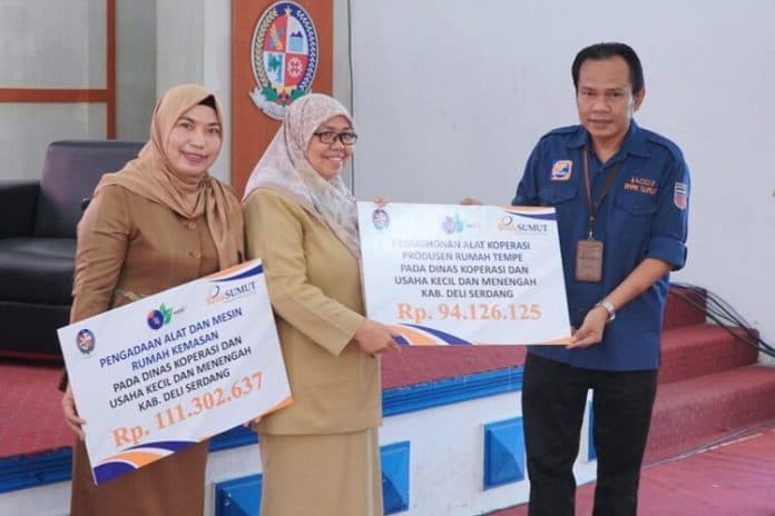 plt_bupati_deli_serdang_bik_mudahkan_masyarakat_dengan_jasa_keuangan