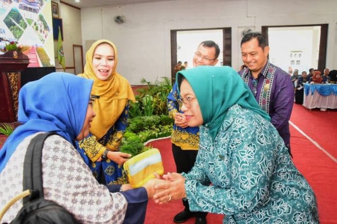 plt_bupati_deli_serdang_pengarusutamaan_gender_strategi_pembangunan
