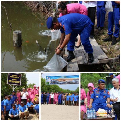 polda_sumut_tabur_10_ribu_benih_ikan_di_belawan