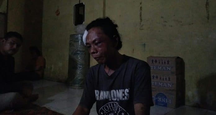 polisi_benarkan_pria_rambut_cepak_diduga_aniaya_tiga_jukir