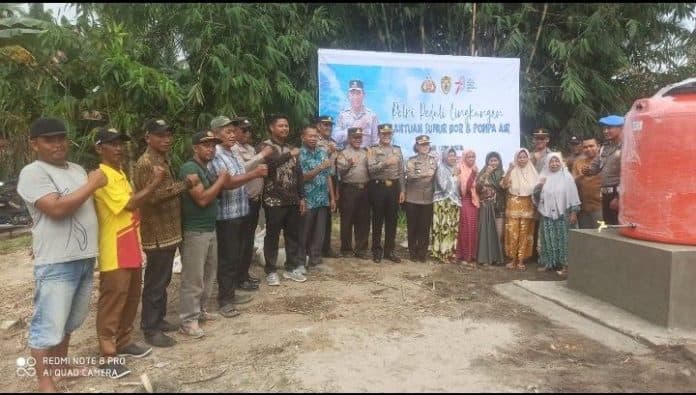 polres_batu_bara_bangun_sumur_bor_100_warga_desa_mekar_mulio_peroleh_air_bersih