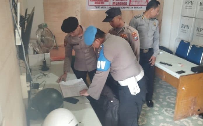 polres_samosir_pastikan_keamanan_gudang_logistik_pilkada_2024