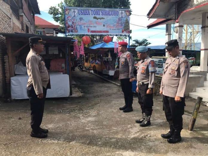 polres_samosir_siapkan_9_pos_pelayanan_jaga_keamanan_jalur_darat_dan_danau