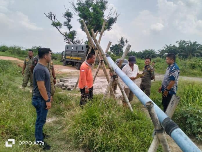 polres_sergai_tindak_tegas_penyedotan_pasir_ilegal_di_desa_sei_belutu