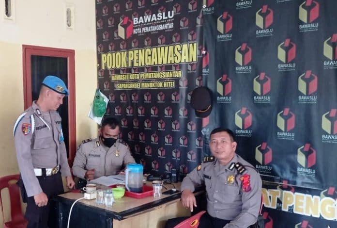 polres_siantar_amankan_dua_lokasi_sentral_penyelenggara_pemilu