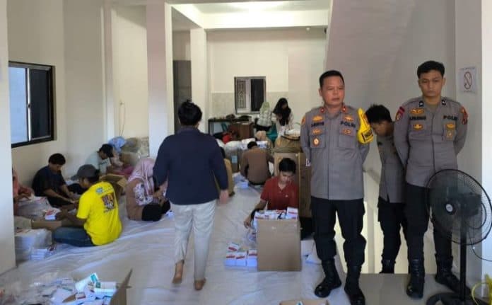 polres_sibolga_perketat_pengamanan_penyortiran_dan_pengepakan_surat_suara