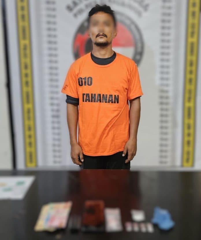polres_simalungun_tangkap_pengedar_sabu_di_gudang_sawit_simalungun