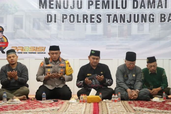polres_tanjung_balai_gelar_doa_bersama_untuk_pemilu_damai_2024