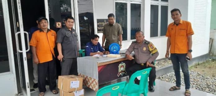 polres_tanjung_balai_siagakan_personel_saat_pendistribusian_logistik_pemilu_2024