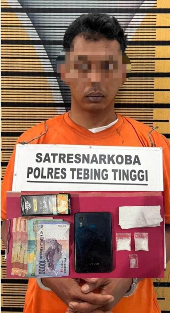 polres_tebing_tinggi_amankan_seorang_pria_warga_dolok_merawan