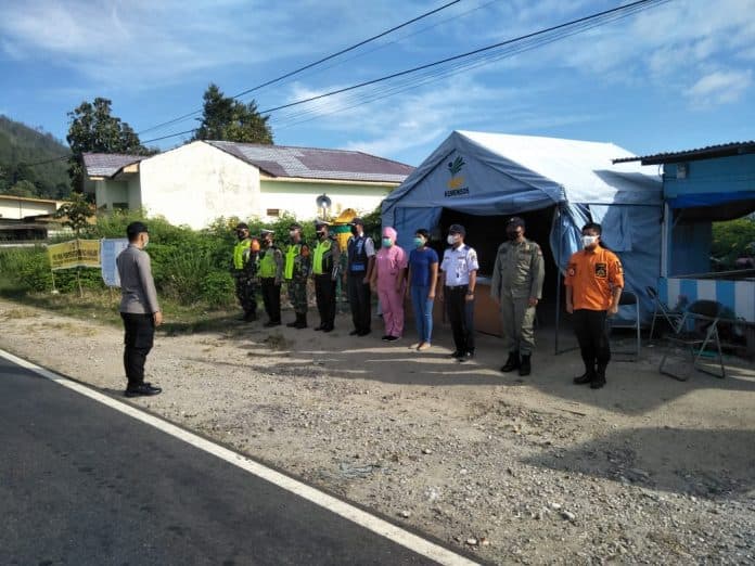 polres_toba_penyekatan_kryd_diperpanjang_hingga_31_mei_2021