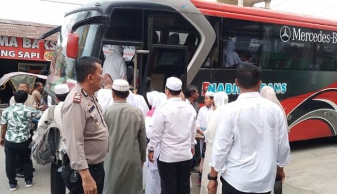 polresta_deli_serdang_boyong_2000_warga_ke_istana_maimun