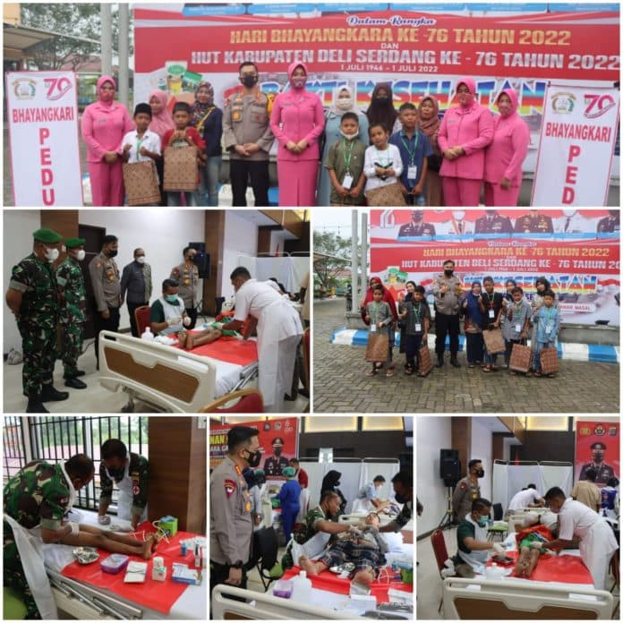 polresta_deli_serdang_gelar_pengobatan_gratis_dan_khitanan_massal