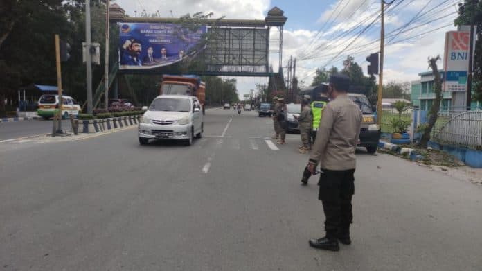 polresta_deli_serdang_urai_kemacetan_di_hari_kedua_idul_fitri