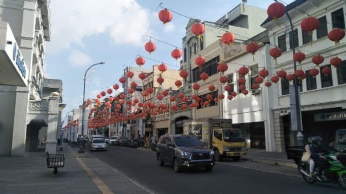 polrestabes_medan_lakukan_pengamanan_lalin_kawasan_vihara_saat_imlek