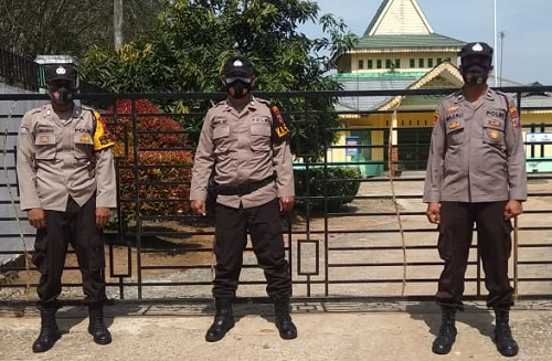 polsek_dolok_merawan_awasi_perlengkapan_pilkades