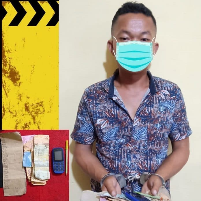 polsek_dolok_panribuan_tangkap_penulis_judi_togel