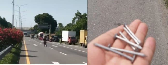 polsek_percut_amankan_sejumlah_paku_yang_berserakan_di_tol_bandar_selamat