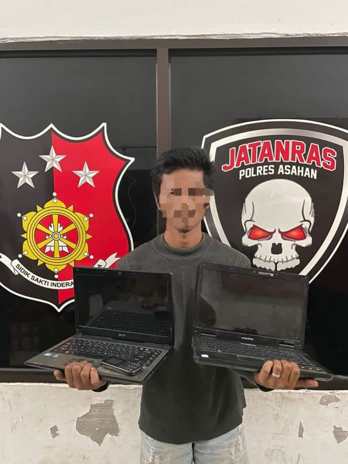 pria_ini_diamankan_polres_asahan_usai_bobol_kios_dan_curi_2_laptop