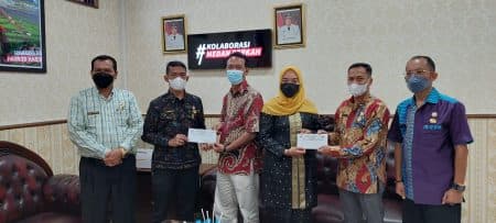 pud_pasar_medan_lunasi_tunggakan_thr_karyawan_muslim_rp13_miliar
