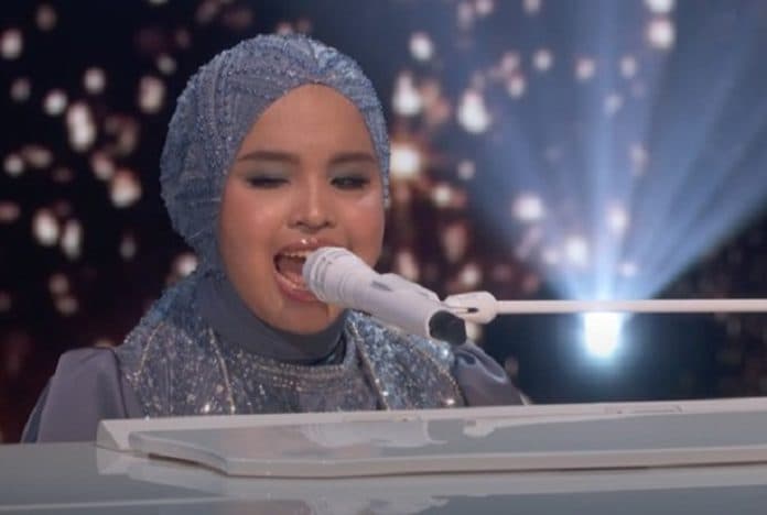 putri_ariani_tampil_menakjubkan_di_babak_final_pujian_juri_agt_2023_mengalir