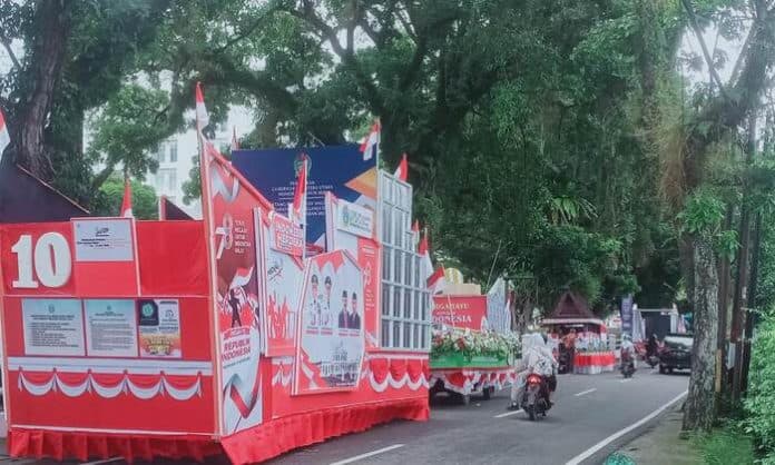 ratusan_mobil_hias_pawai_melintasi_sejumlah_jalan_di_kota_medan