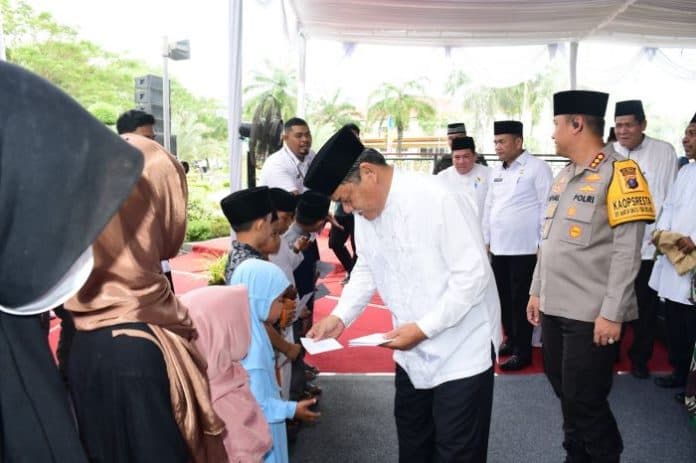 ribuan_umat_islam_hadiri_peringatan_isra_miraj_di_deli_serdang
