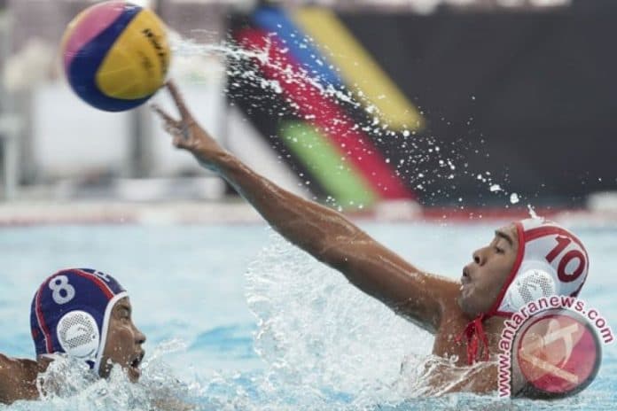 ridjkie_mulia_pembawa_bendera_merah_putih_di_pembukaan_sea_games_2019