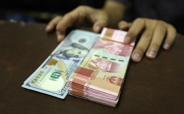 rupiah_was_was_melemah_02_persen_terhadap_dolar