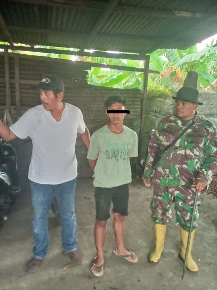 saat_bongkar_muatan_sopir_dan_truk_berisi_sawit_curian_ditangkap_tim_pengamanan_ptpn_ii