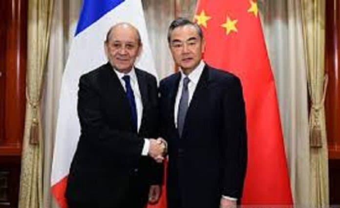 saat_diskusi_dengan_menlu_prancis_wang_yi_china_akan_tegas_hadapi_as_yang_semena_mena