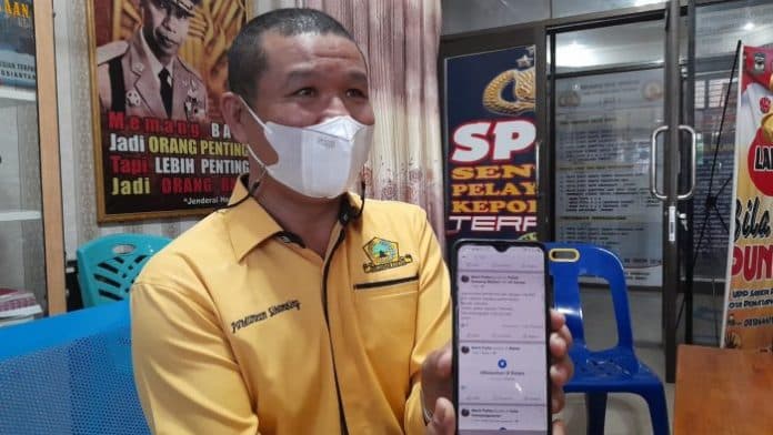 sangkut_pautkan_partai_golkar_dengan_thm_ferrari_akun_fb_murni_purba_dilaporkan_ke_polres_siantar