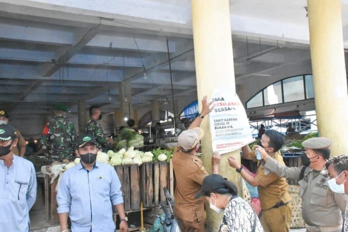 satgas_covid_19_edukasi_penerapan_prokes_ke_pasar_tebing_tinggi