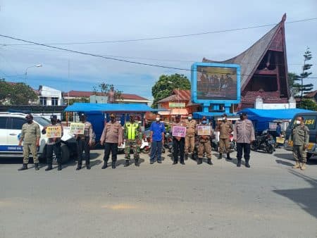 satgas_covid_19_toba_gelar_operasi_yustisi_di_pasar_tumpah_ruah_balige