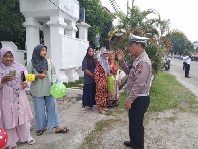 satlantas_polres_tanjung_balai_ingatkan_orang_tua_soal_usia_pengendara