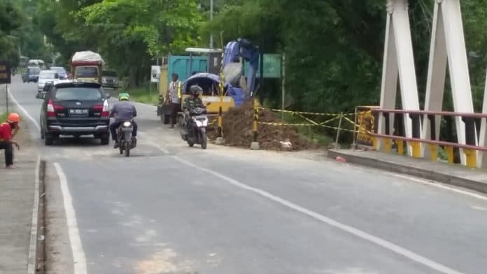 seminggu_jelang_lebaran_arus_lalu_lintas_perbatasan_siantar_simalungun_ramai_lancar