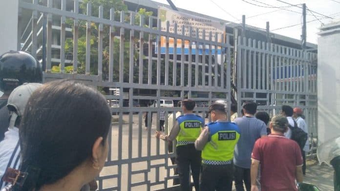 sempat_tawuran_kampus_nommensen_medan_dijaga_polisi