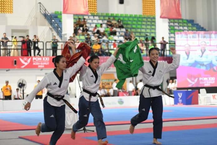 tanpa_ekspektasi_tinggi_trio_atlet_taekwondo_poomsae_sumut_raih_emas_pon_xxi