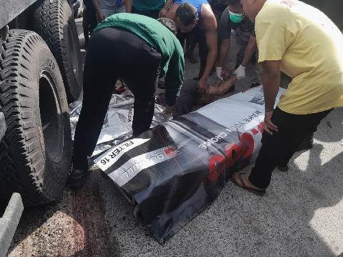 terseret_3_meter_pengendara_motor_tewas_dilindas_truk_kontainer_di_medan