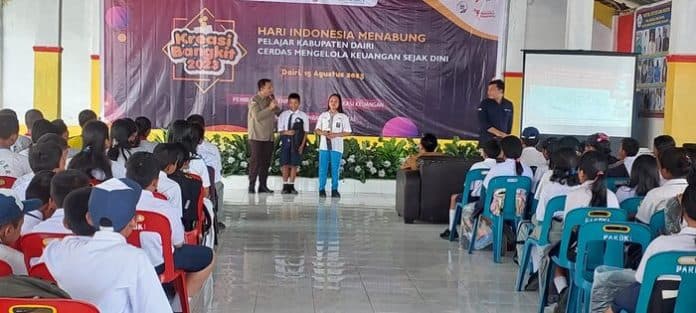 tim_percepatan_akses_keuangan_daerah_dairi_ajak_pelajar_silahisabungan_cerdas_mengelola_keuangan_sejak_dini