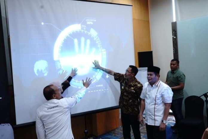 tingkatkan_penerapan_etpd_pemkab_labusel_bersama_bank_sumut_launching_kkpd