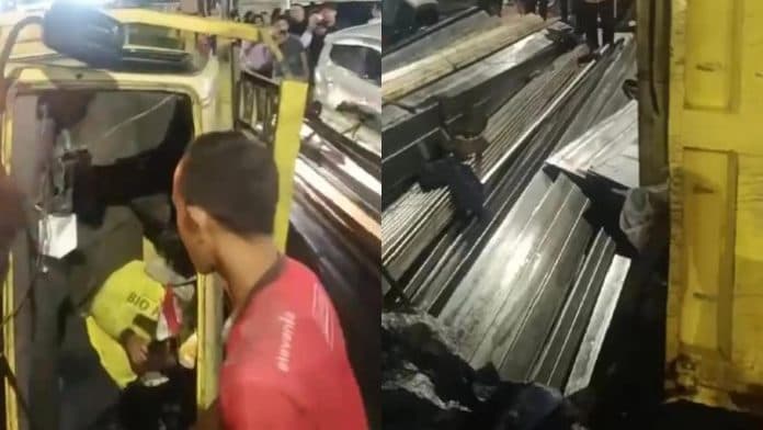 truk_bawa_besi_di_jalan_halat_medan_terbalik