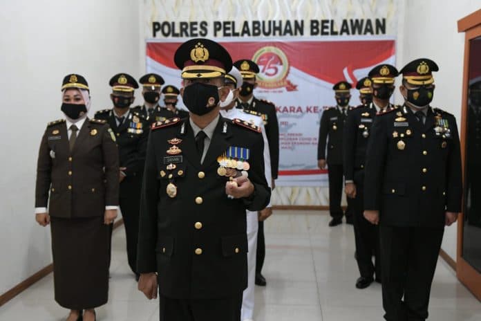 upacara_hut_bhayangkara_ke_75_di_mapolres_pelabuhan_belawan_dilaksanakan_secara_virtual